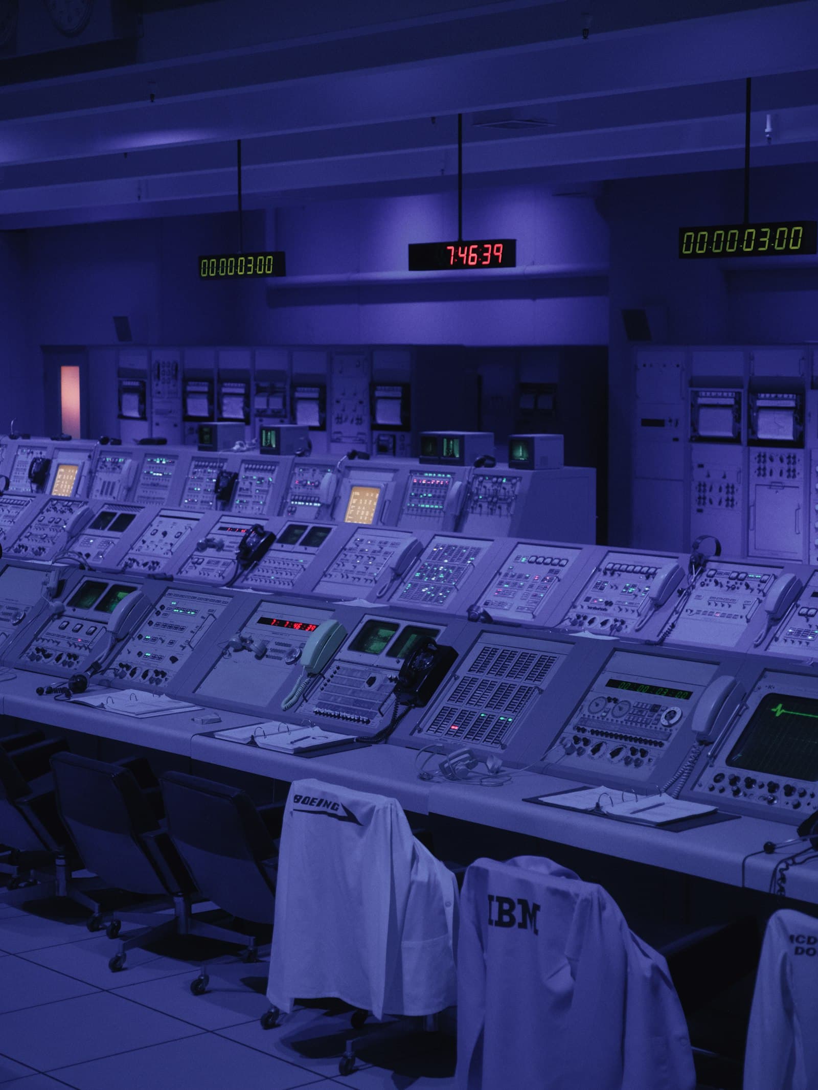 The ASL watch floor: operators at consoles under blue light