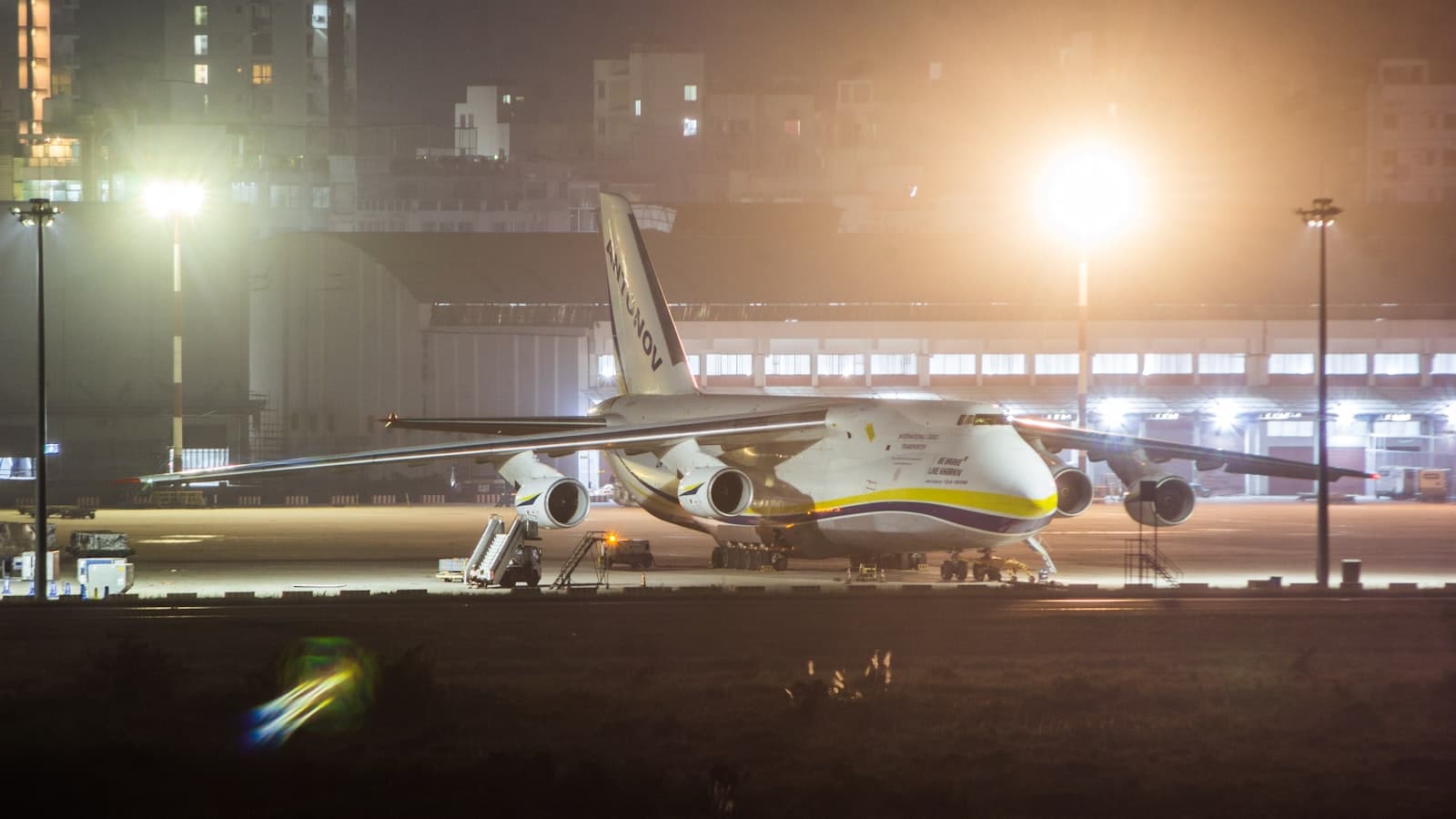 Freighter aircraft on the tarmac at night